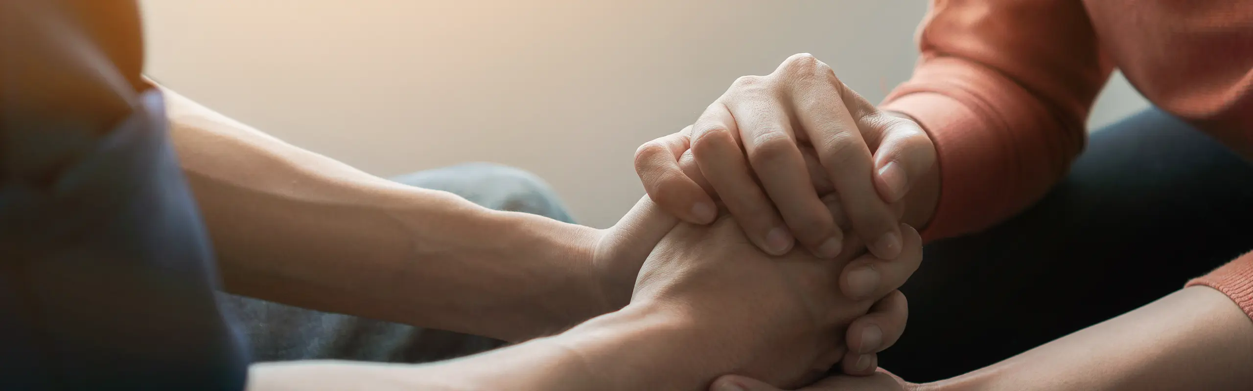 Holding hands in support